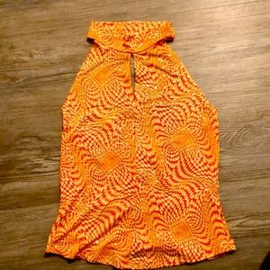 Psychedelic print orange shimmery halter top